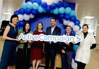 Taoiseach Leo Varadkar standing with ActiveCampaign representatives